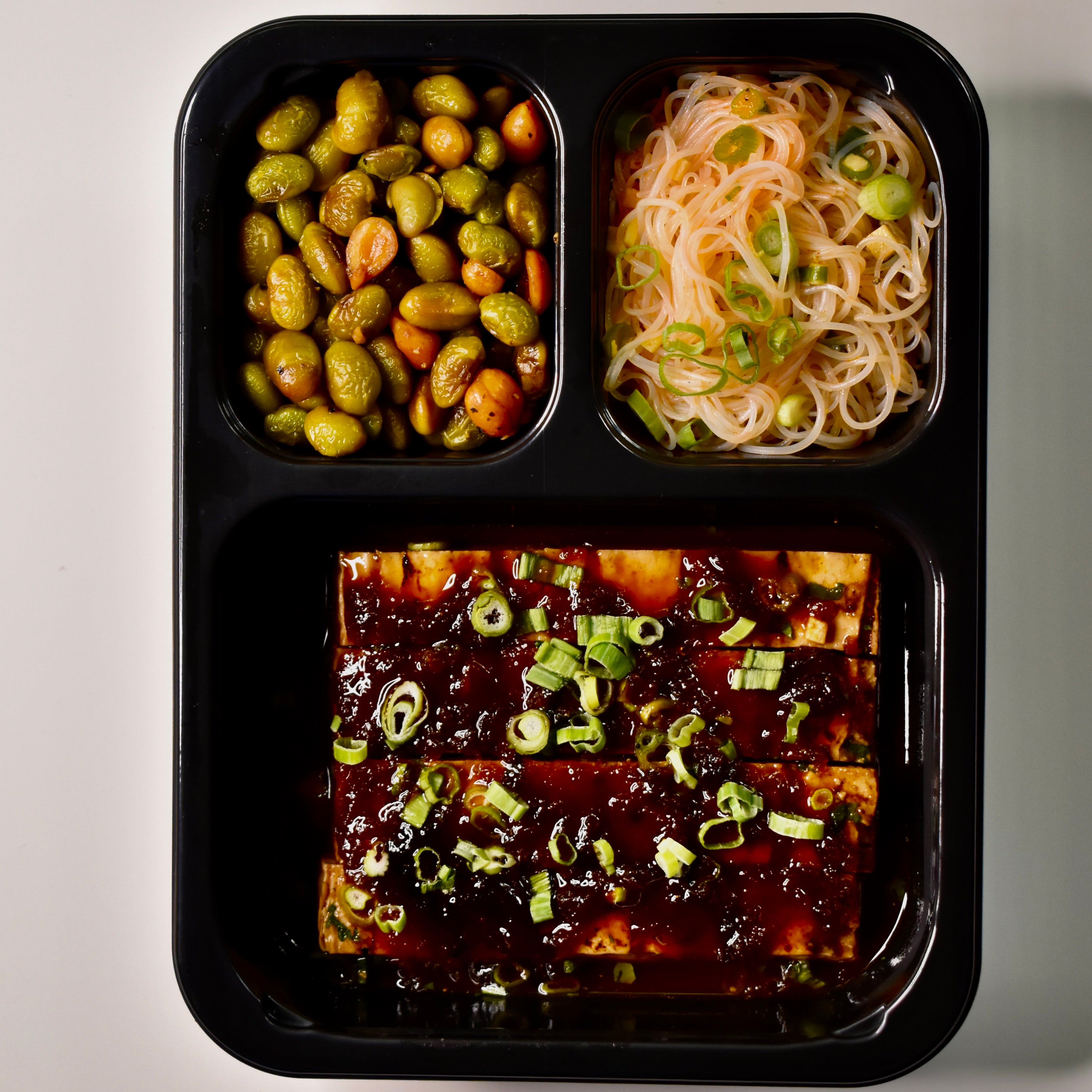 Sticky Asian BBQ Tofu with Ginger Rice Noodles and Peanut Roasted Edamame