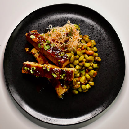 Sticky Asian BBQ Tofu with Ginger Rice Noodles and Peanut Roasted Edamame